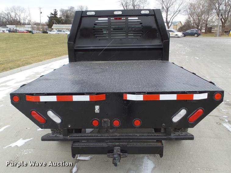 image for item L5730 2013 Chevrolet Silverado 2500HD flatbed pickup truck