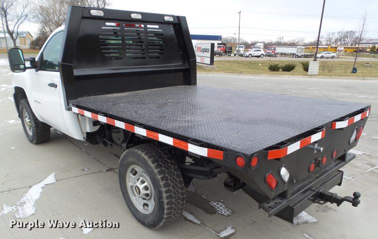 image for item L5730 2013 Chevrolet Silverado 2500HD flatbed pickup truck