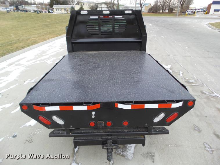 image for item L5730 2013 Chevrolet Silverado 2500HD flatbed pickup truck