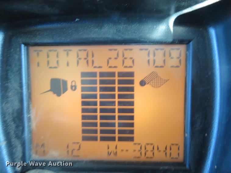 image for item BU9996 2013 Vermeer 605 Super M Cornstalk Special round baler