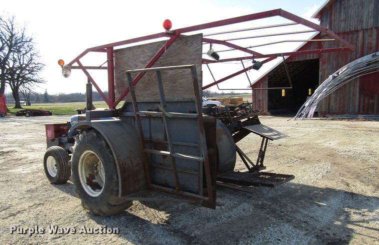 image for item DD3875 Ford 3930 tractor with Texas sod harvester
