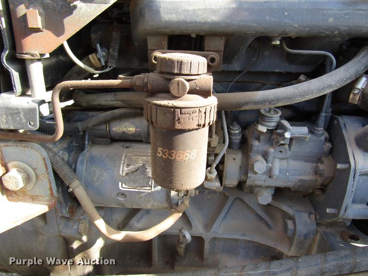 image for item DD3875 Ford 3930 tractor with Texas sod harvester