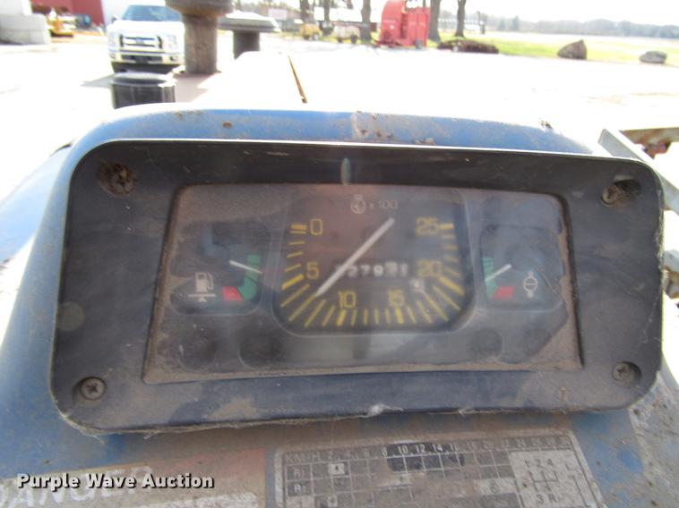 image for item DD3875 Ford 3930 tractor with Texas sod harvester