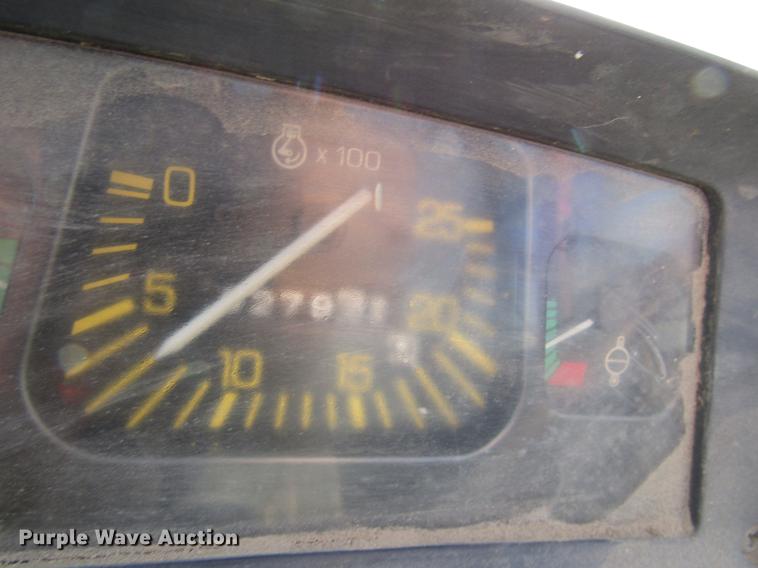 image for item DD3875 Ford 3930 tractor with Texas sod harvester