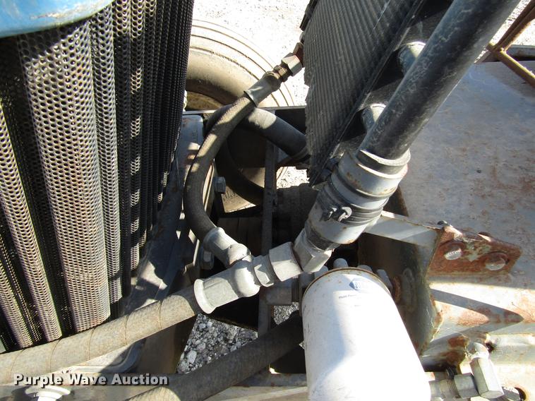 image for item DD3875 Ford 3930 tractor with Texas sod harvester