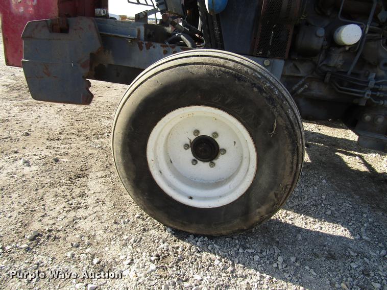image for item DD3875 Ford 3930 tractor with Texas sod harvester