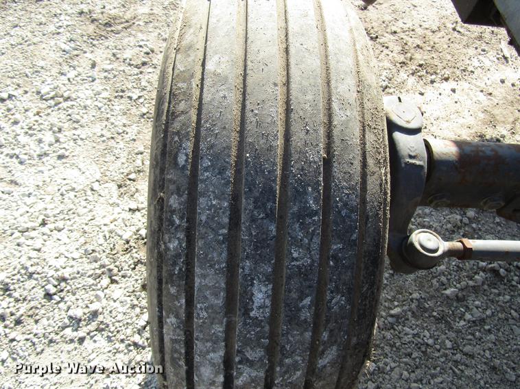 image for item DD3875 Ford 3930 tractor with Texas sod harvester