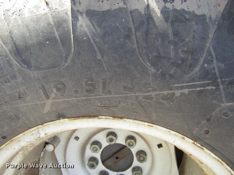 image for item DD3875 Ford 3930 tractor with Texas sod harvester