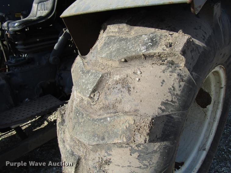 image for item DD3875 Ford 3930 tractor with Texas sod harvester