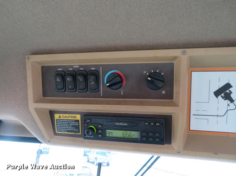 image for item DE8778 2006 John Deere 4895 windrower