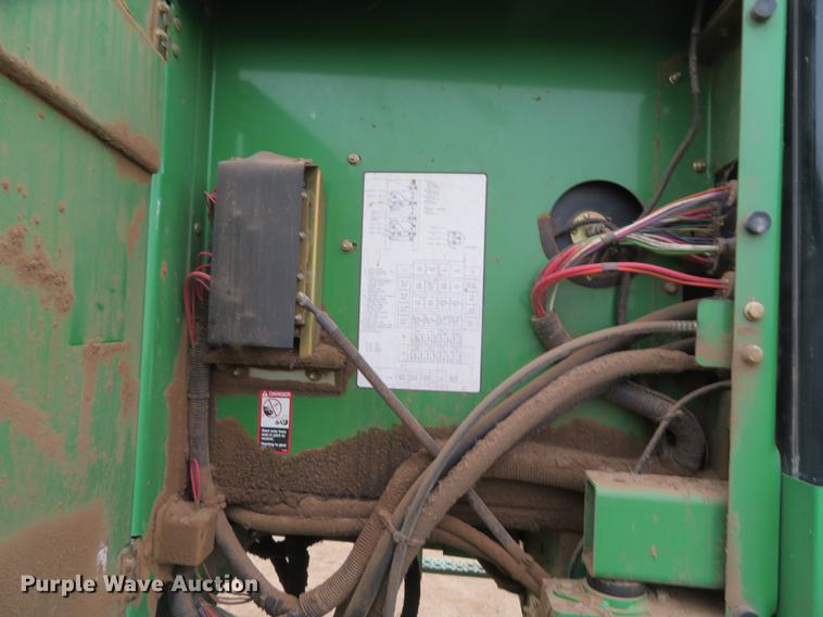 image for item DE8778 2006 John Deere 4895 windrower