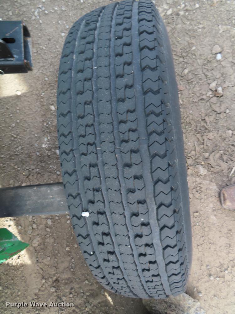 image for item DF1313 1998 John Deere 930 flex head and trailer