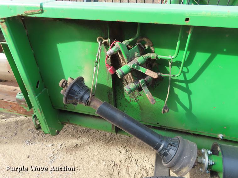 image for item DF1313 1998 John Deere 930 flex head and trailer