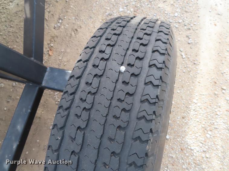 image for item DF1313 1998 John Deere 930 flex head and trailer