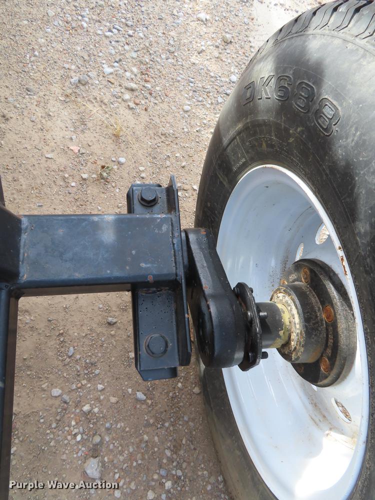 image for item DF1313 1998 John Deere 930 flex head and trailer