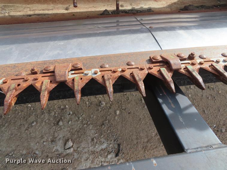 image for item DF1313 1998 John Deere 930 flex head and trailer