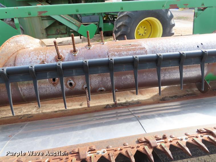 image for item DF1313 1998 John Deere 930 flex head and trailer