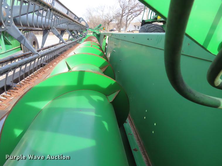 image for item DF1313 1998 John Deere 930 flex head and trailer