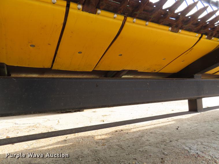 image for item DF1313 1998 John Deere 930 flex head and trailer