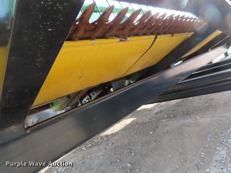 image for item DF1313 1998 John Deere 930 flex head and trailer