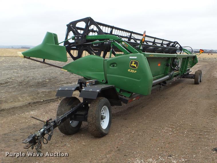 image for item DX9728 2011 John Deere 635F flex head and trailer