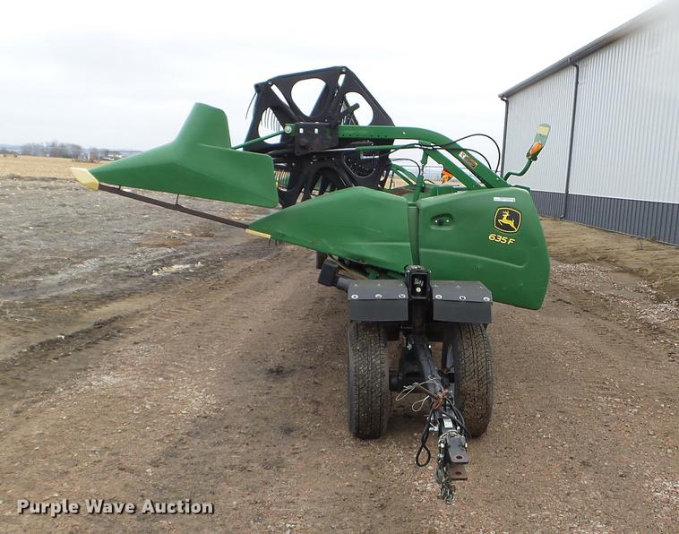 image for item DX9728 2011 John Deere 635F flex head and trailer