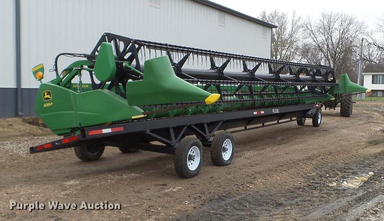 image for item DX9728 2011 John Deere 635F flex head and trailer
