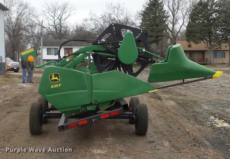 image for item DX9728 2011 John Deere 635F flex head and trailer