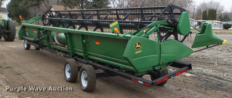 image for item DX9728 2011 John Deere 635F flex head and trailer