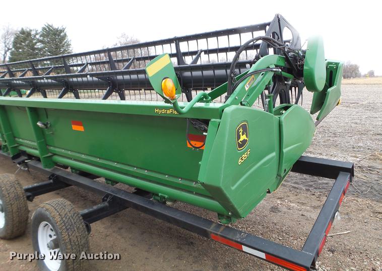 image for item DX9728 2011 John Deere 635F flex head and trailer