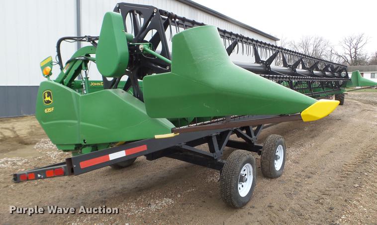 image for item DX9728 2011 John Deere 635F flex head and trailer