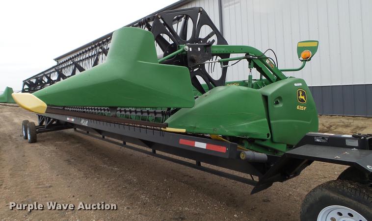 image for item DX9728 2011 John Deere 635F flex head and trailer