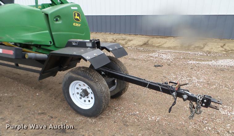 image for item DX9728 2011 John Deere 635F flex head and trailer