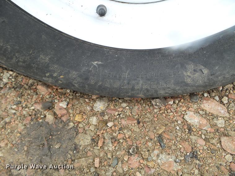 image for item DX9728 2011 John Deere 635F flex head and trailer