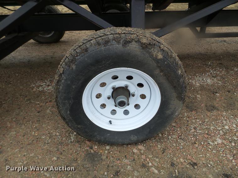 image for item DX9728 2011 John Deere 635F flex head and trailer