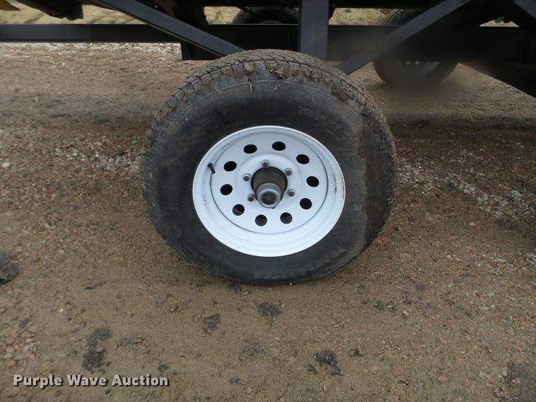 image for item DX9728 2011 John Deere 635F flex head and trailer