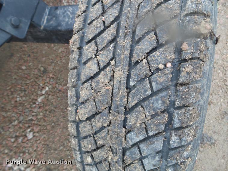 image for item DX9728 2011 John Deere 635F flex head and trailer