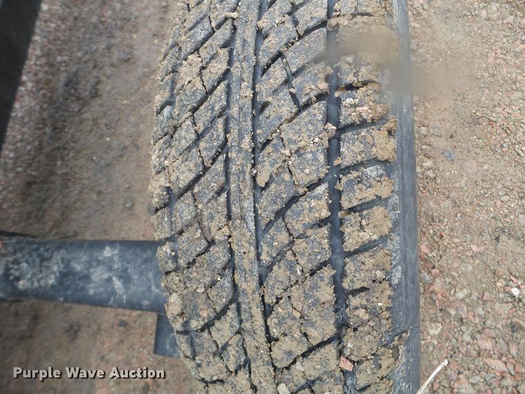 image for item DX9728 2011 John Deere 635F flex head and trailer