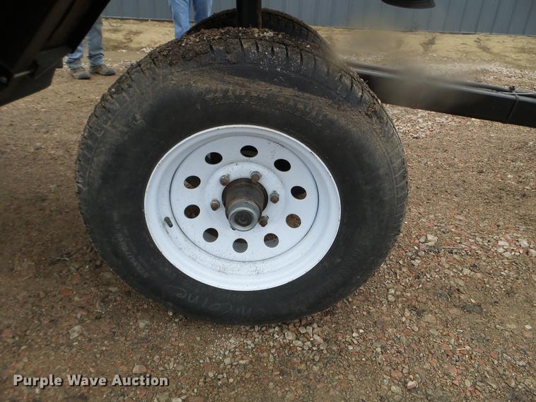 image for item DX9728 2011 John Deere 635F flex head and trailer