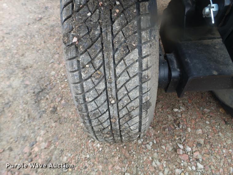 image for item DX9728 2011 John Deere 635F flex head and trailer