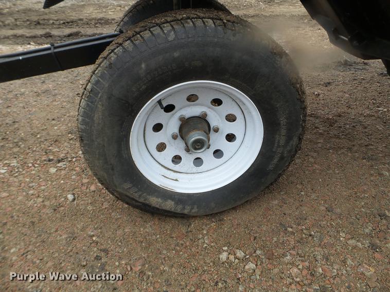 image for item DX9728 2011 John Deere 635F flex head and trailer