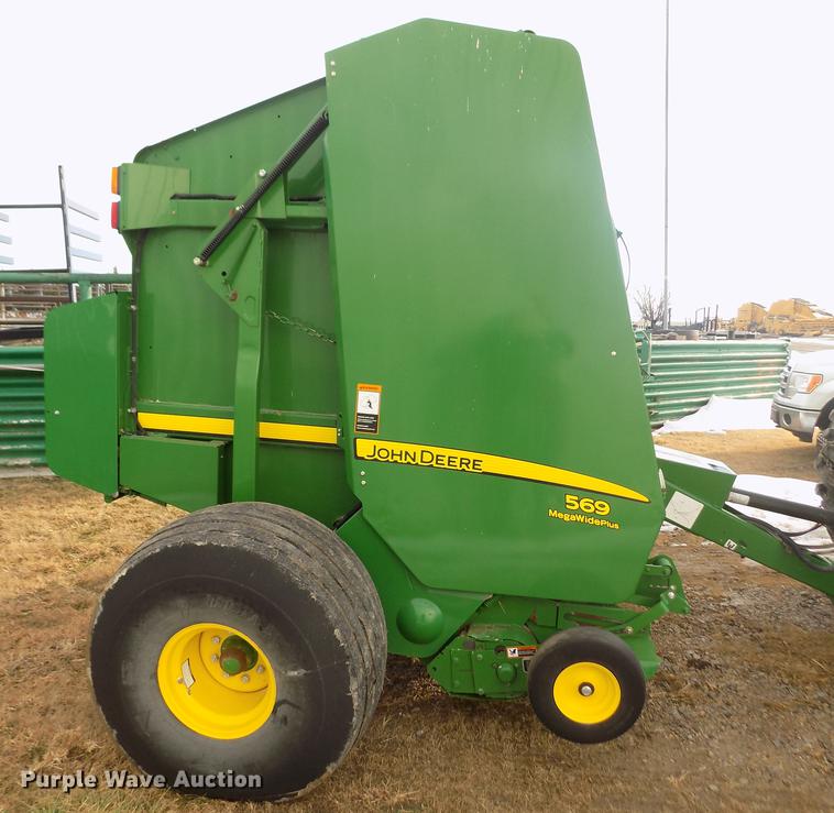 image for item DY9163 2013 John Deere 569 Mega Wide Plus round baler