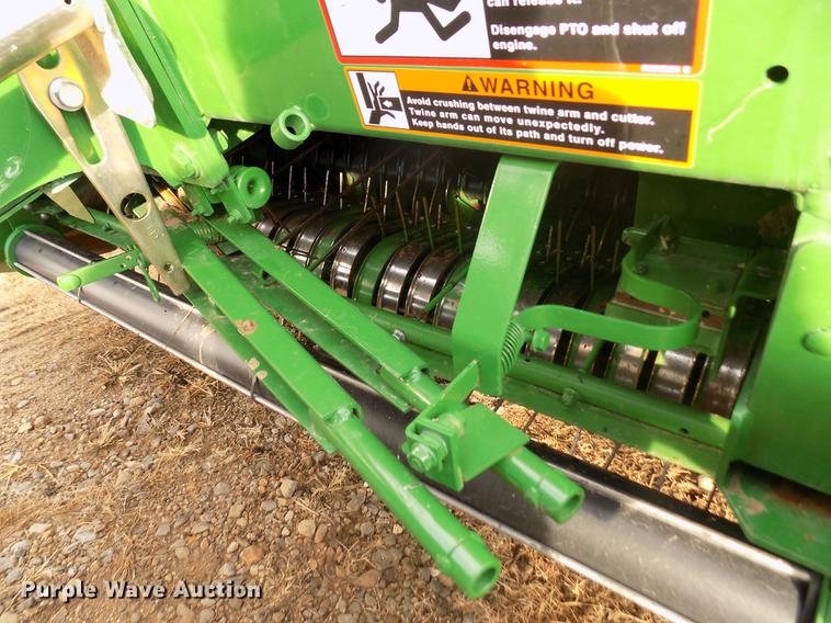 image for item DY9163 2013 John Deere 569 Mega Wide Plus round baler