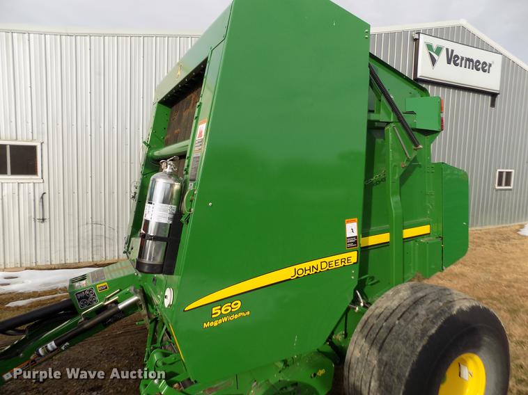 image for item DY9163 2013 John Deere 569 Mega Wide Plus round baler