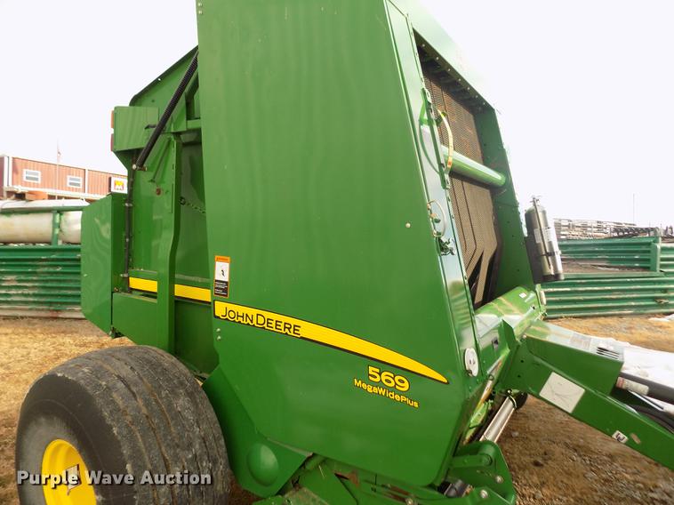 image for item DY9163 2013 John Deere 569 Mega Wide Plus round baler