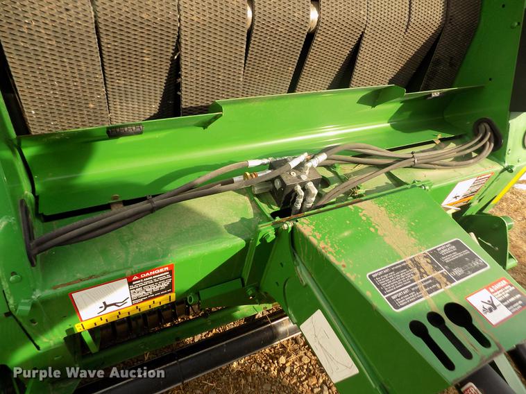 image for item DY9163 2013 John Deere 569 Mega Wide Plus round baler