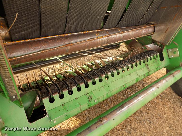 image for item DY9163 2013 John Deere 569 Mega Wide Plus round baler