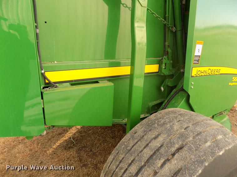 image for item DY9163 2013 John Deere 569 Mega Wide Plus round baler