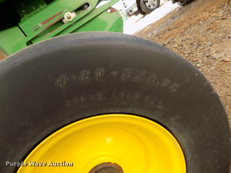 image for item DY9163 2013 John Deere 569 Mega Wide Plus round baler