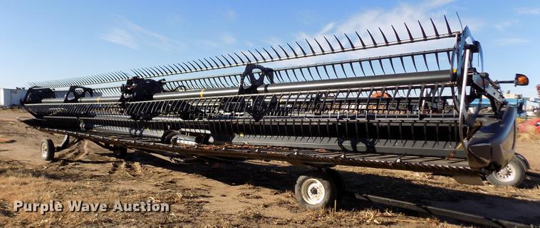 image for item FE9277 2013 MacDon FD75D draper flex head